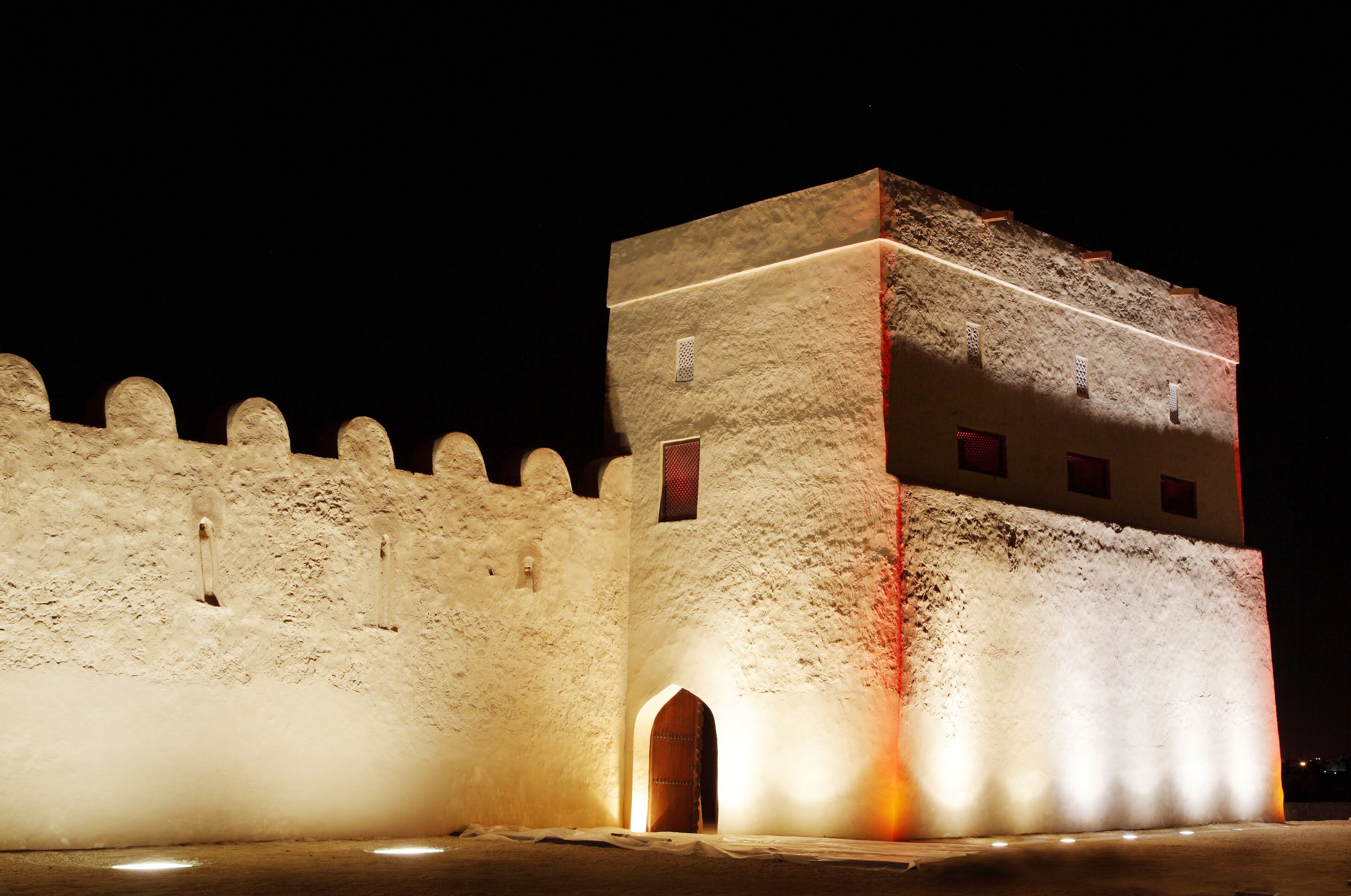 Entrance of Riffa fort at night, Bahrain