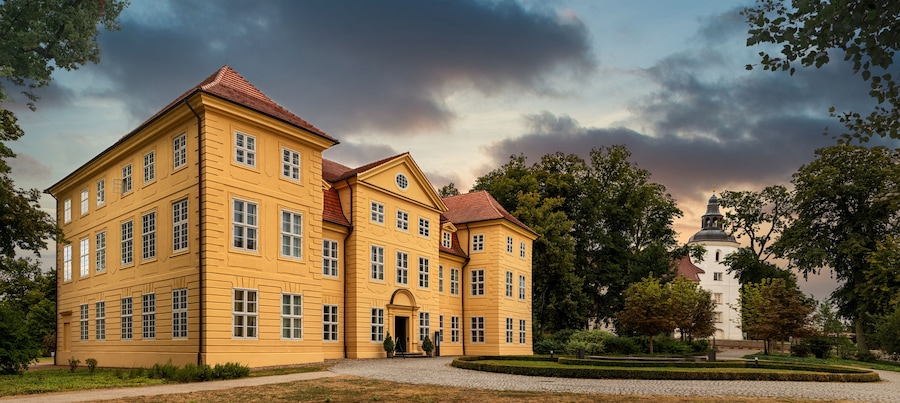 Panoramic view of Castle Mirow with Church Johanniterkirche (Germany)