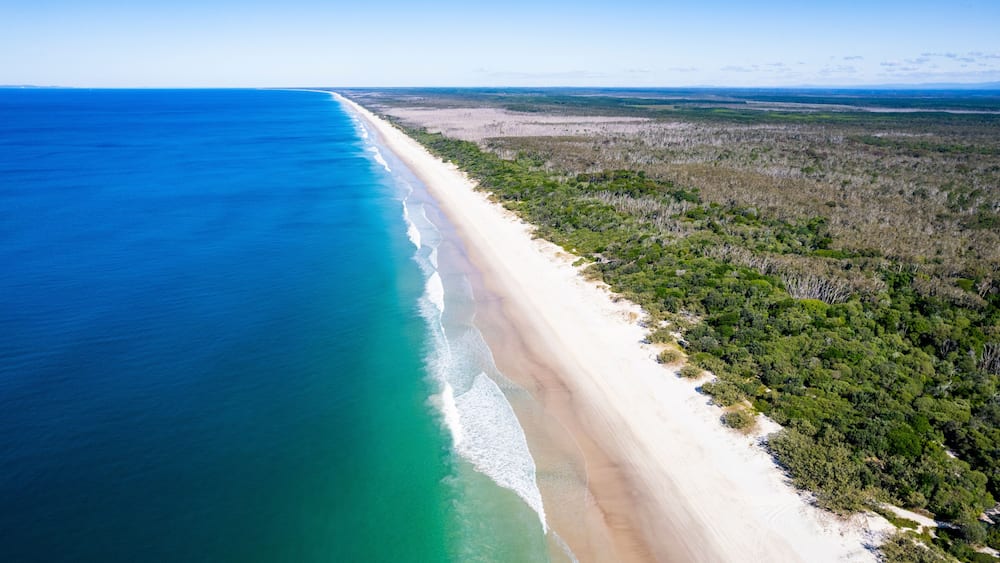 Aerial view of Tropical Paradise Beach along Coral Sea, Bribie Island, Australia.