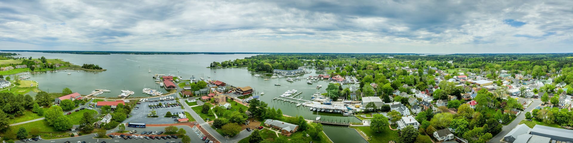 Aerial panorama of shipyard and lighthouse in St. Michaels harbor in Maryland in the Chesapeake Bay