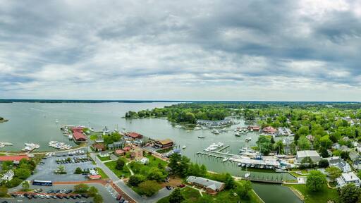 Aerial panorama of shipyard and lighthouse in St. Michaels harbor in Maryland in the Chesapeake Bay