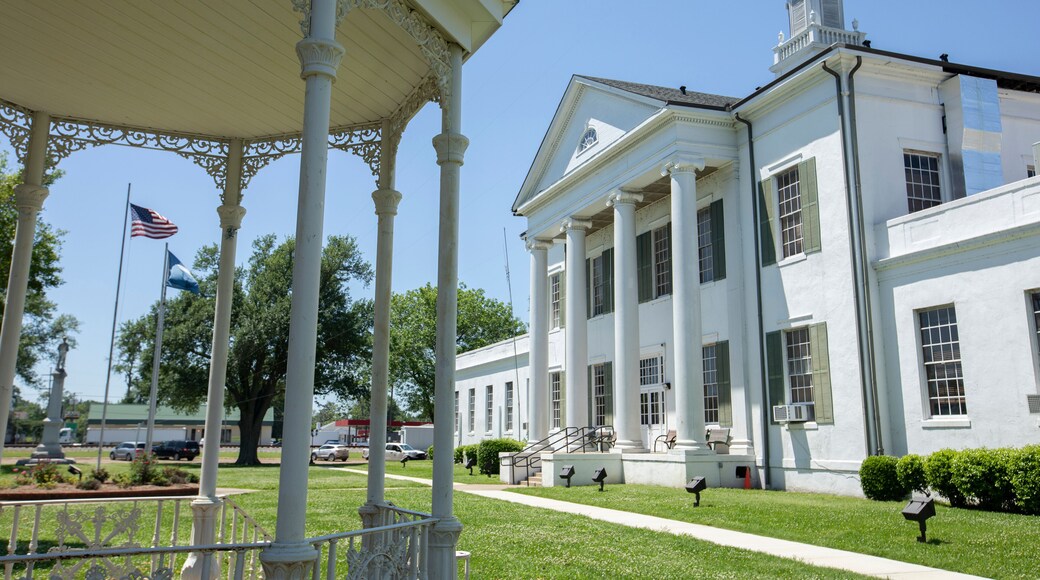 Tallulah, Louisiana, USA - April 23, 2024: Afternoon sun shines on the historic 1887 Madison Parish Courthouse of downtown Tallulah.