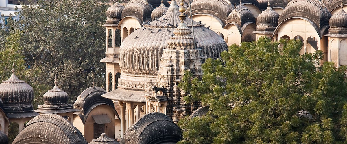 A historic building with multiple domes and intricate architecture.