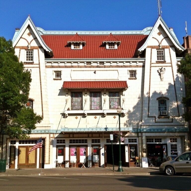 The Liberty Theater opened in 1917 (originally named the American Theater) with a design based on traditional Dutch architecture, including creamy terra cotta tiles covering the facade. Inside, marble and tile filled the lobby, while each of the theater's 1000 seats were crafted of mahogany and Spanish leather. The theater itself was a technical marvel, with two projection machines, a $10,000 heating and ventilation system, and a $25,000 organ  (the movies themselves were silent).

Today, the theater exists as an extension of the Macy's department store. Apparently the original seats remain, hidden beneath a false floor.