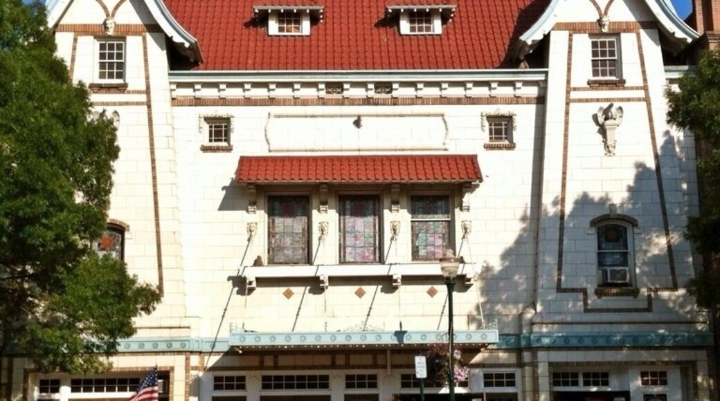 The Liberty Theater opened in 1917 (originally named the American Theater) with a design based on traditional Dutch architecture, including creamy terra cotta tiles covering the facade. Inside, marble and tile filled the lobby, while each of the theater's 1000 seats were crafted of mahogany and Spanish leather. The theater itself was a technical marvel, with two projection machines, a $10,000 heating and ventilation system, and a $25,000 organ (the movies themselves were silent).
Today, the theater exists as an extension of the Macy's department store. Apparently the original seats remain, hidden beneath a false floor.