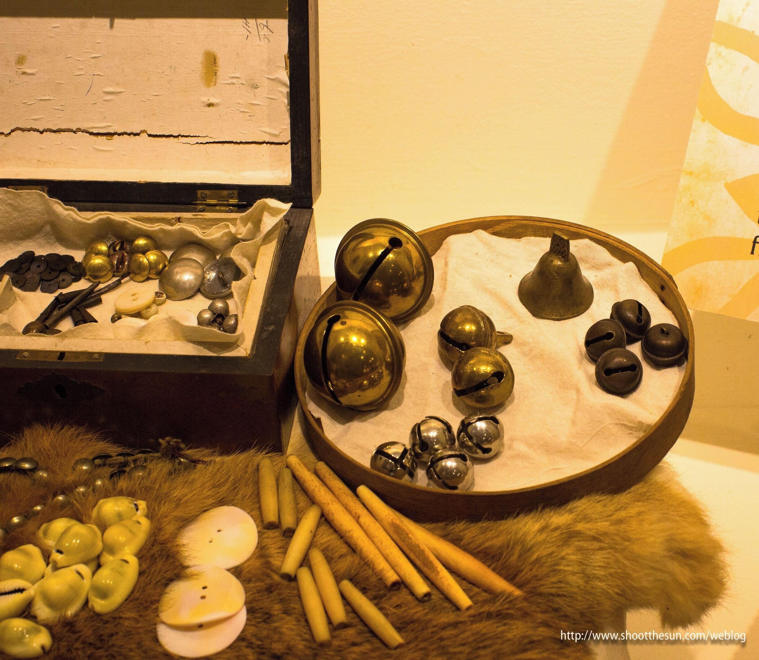Bells, buttons and beads used in Native American fabric art.