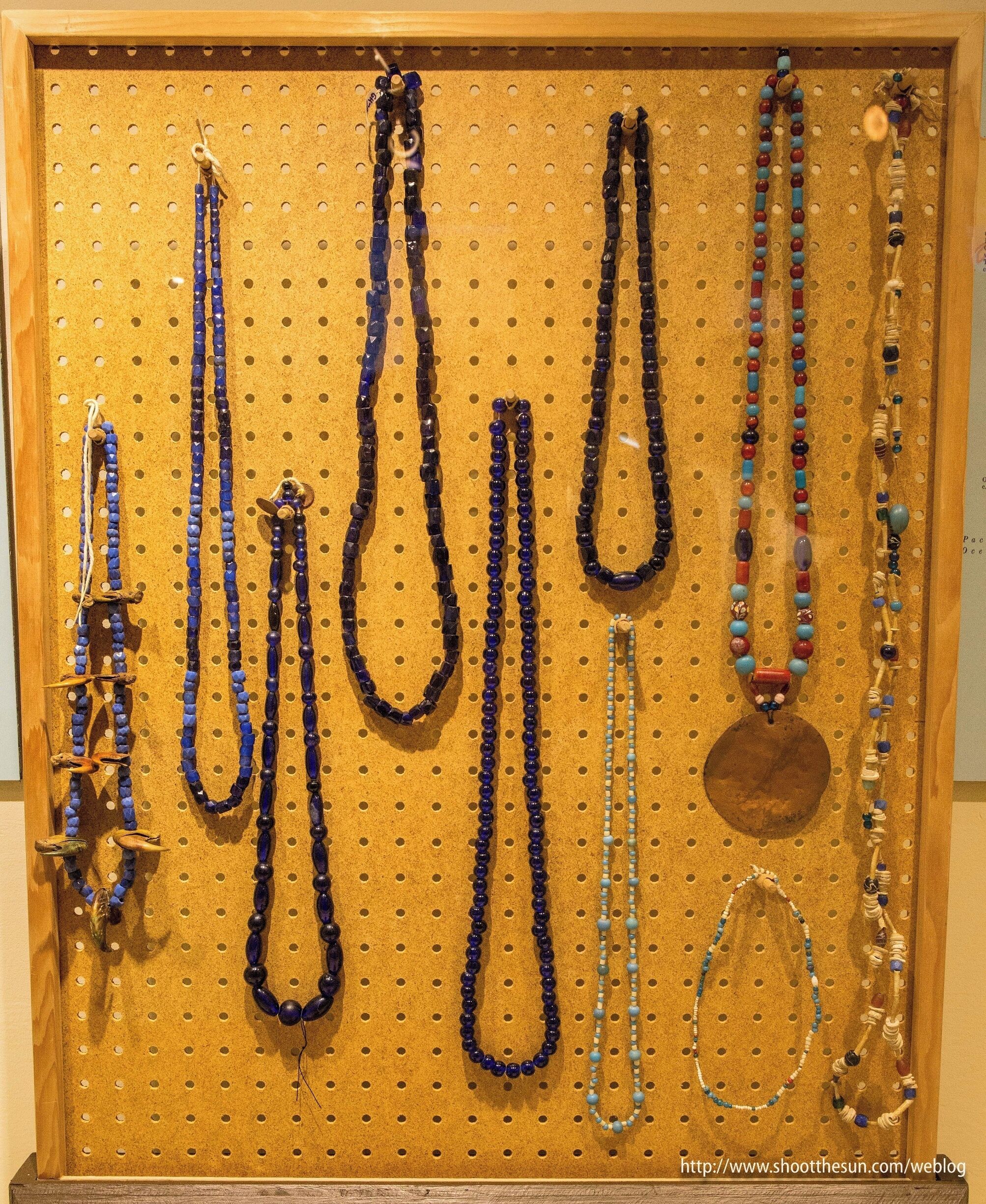 Glass trade bead necklaces crafted in the 18th and 19th centuries by Native American artists local to the Columbia River area.

The one on the far left contains mountain lion dew claws.