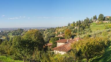 View of the hills that surround Bergamo during a day with clear blue sky, Orobie area, Lombardy, Italy