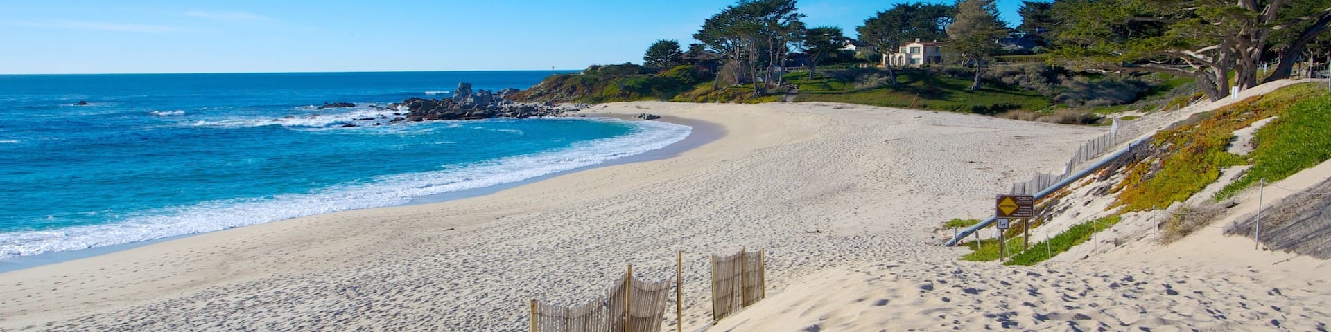 Carmel Beach which includes general coastal views, landscape views and a sandy beach
