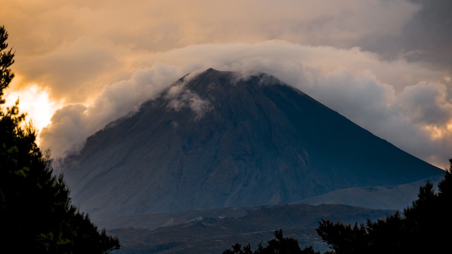 Tongariro National Park which includes a sunset, mountains and landscape views