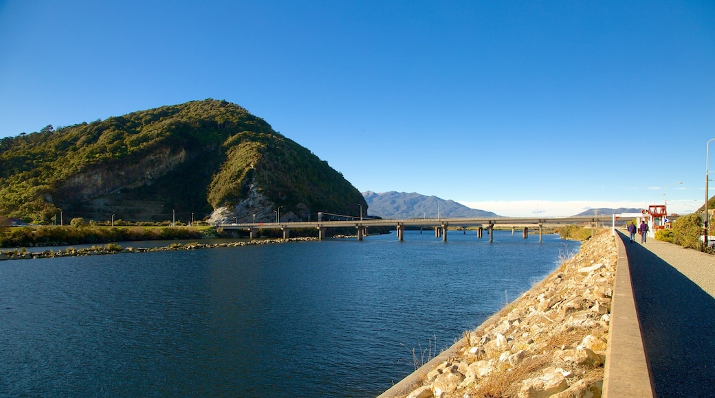 Greymouth which includes mountains and a river or creek