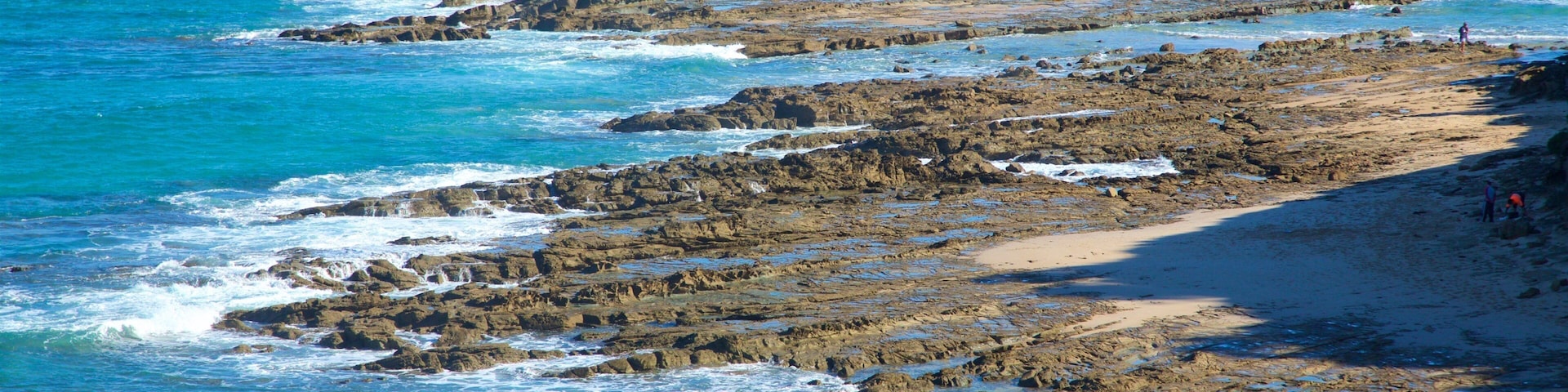 Great Ocean Road que incluye costa rocosa y vista general a la costa