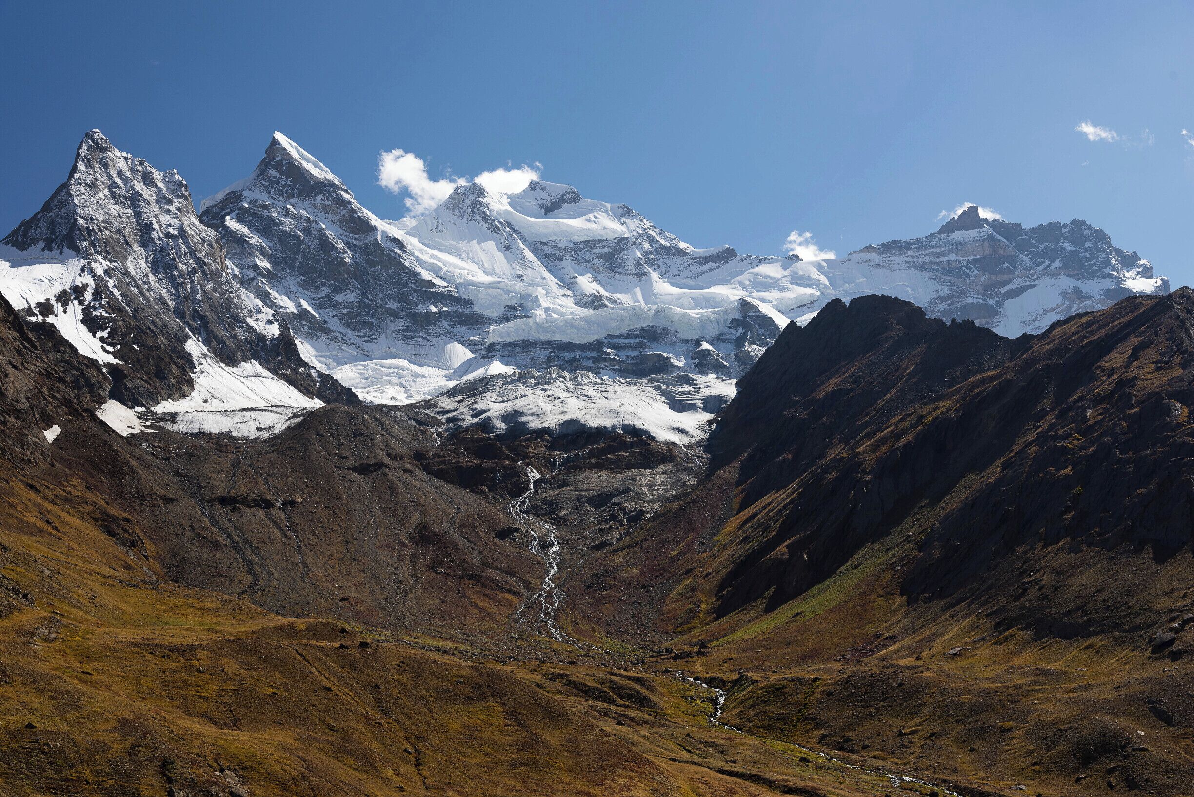 We were heading down towards the Suru Valley, near Kashmir towards Rangdum Monestary surrounded by mountains.

This is a very remote area in northern India, wild and a long bumpy ride from the main road.  Well worth the trip - unlikely you will see another tourist and you'll be surrounded by breath taking mountains.

#Mountains #india #kashmir #jammu #rangdummonstary #remote #wild