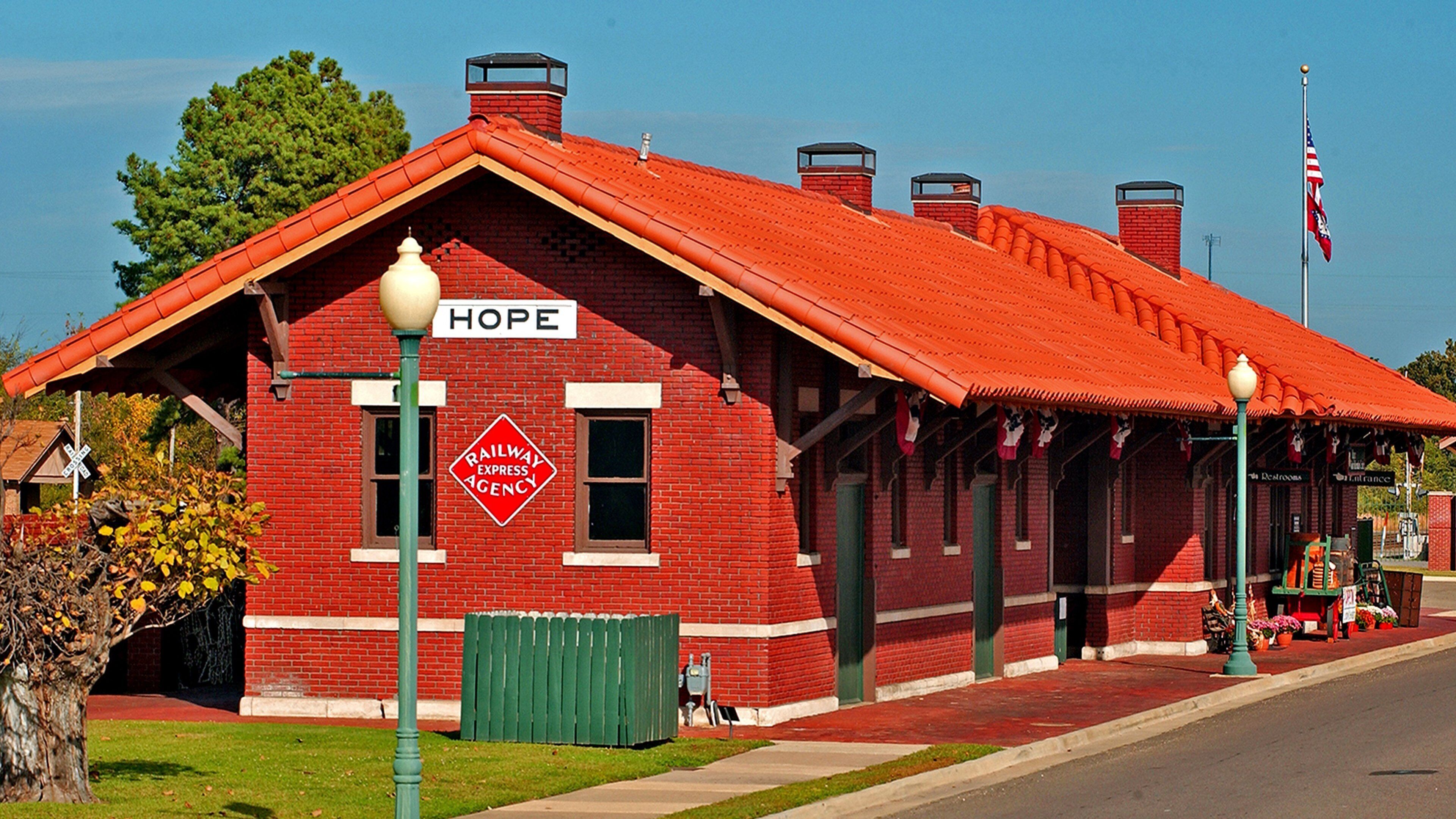 A red brick building with a sign that reads "HOPE" and "Railway Express Agency".