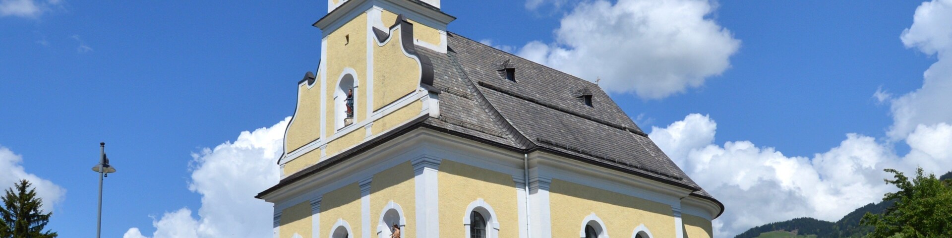 Itter showing a small town or village and a church or cathedral