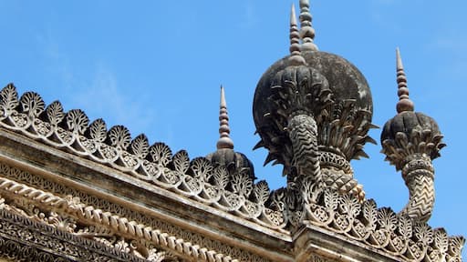 Ornate temple architecture with intricate carvings and multiple spires.