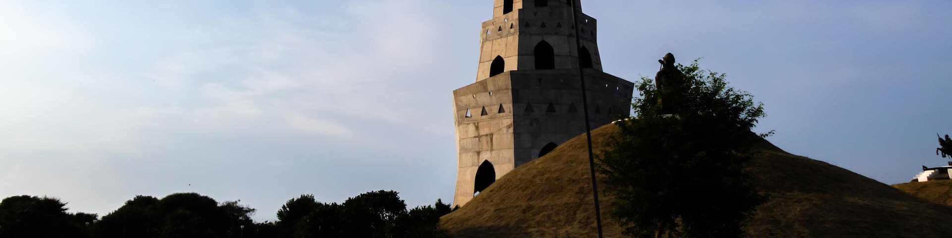 wide shot of historic fateh burj against sky in the background. historic memorial concept.