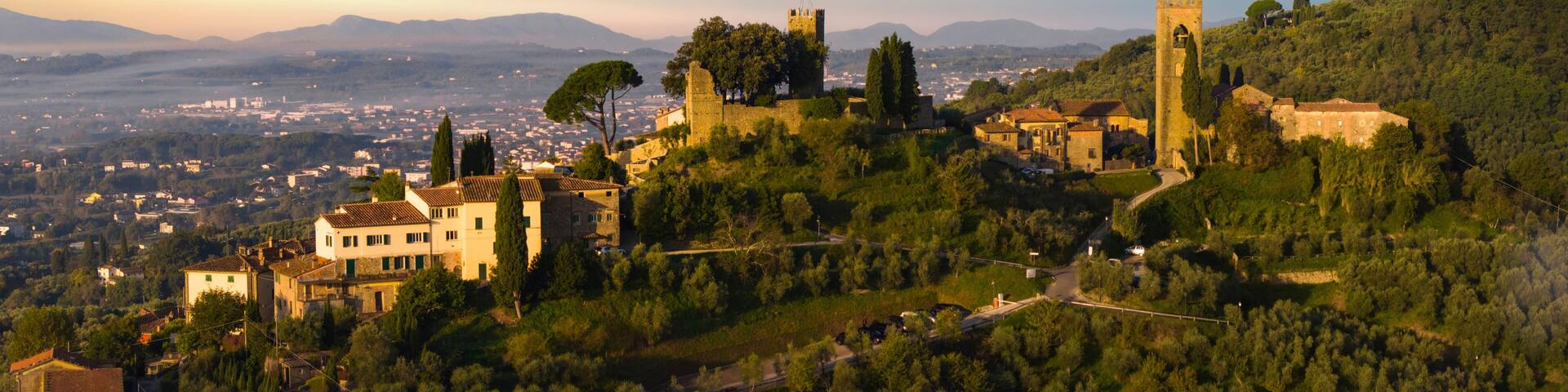 Italy, Idyllic traditional towns of romantic Tuscany.. Picturesque borgo Buggiano hill top medieval village near Pienza. Panoramic drone view in morning light
