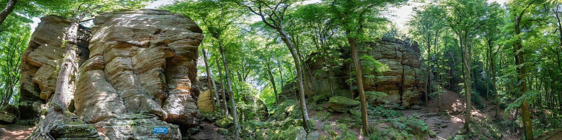 Rock formations at Berdorf in Luxembourg during summer on Mullerthal hiking trail