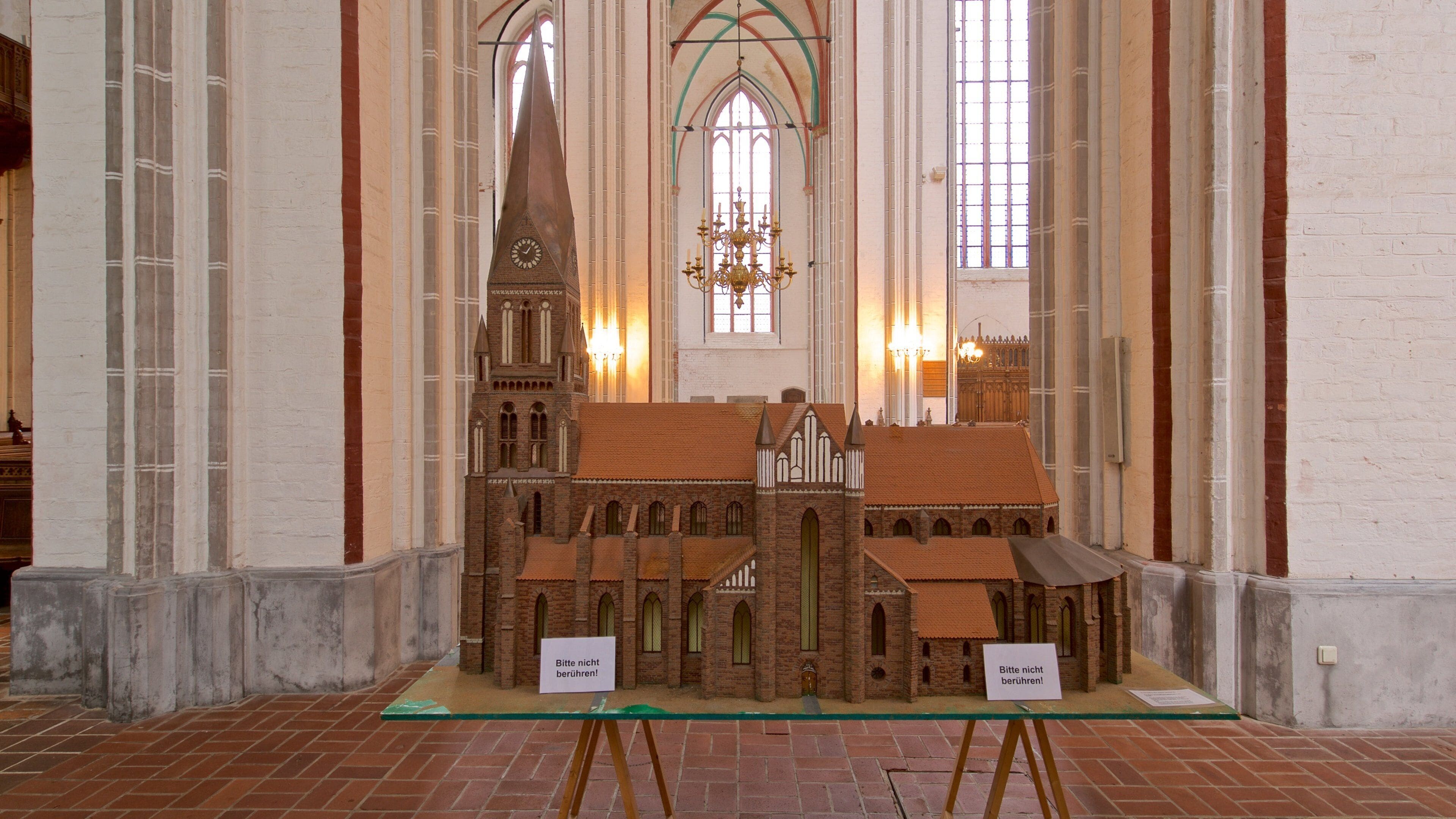 Schwerin Cathedral featuring a church or cathedral, heritage elements and interior views
