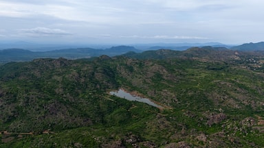 A mountainous landscape with a river winding through it.