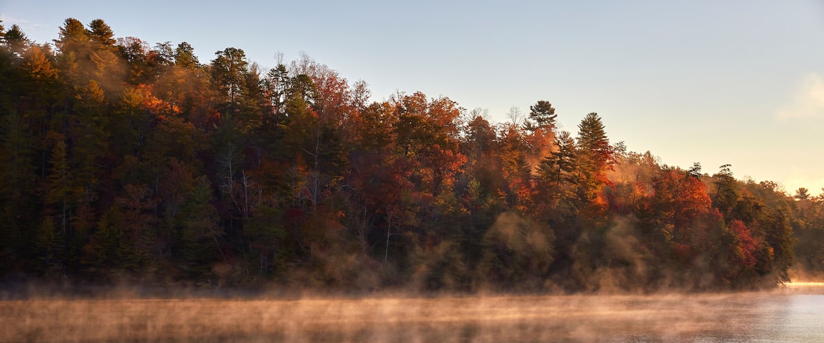 Early morning autumn reflection at Philpott Lake, located in the foothills of the Blue Ridge mountains near Stuart, Virginia