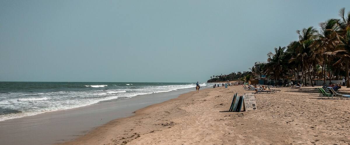 African surf board rent. Surf boards for rent at the beach. Kotu, The Gambia