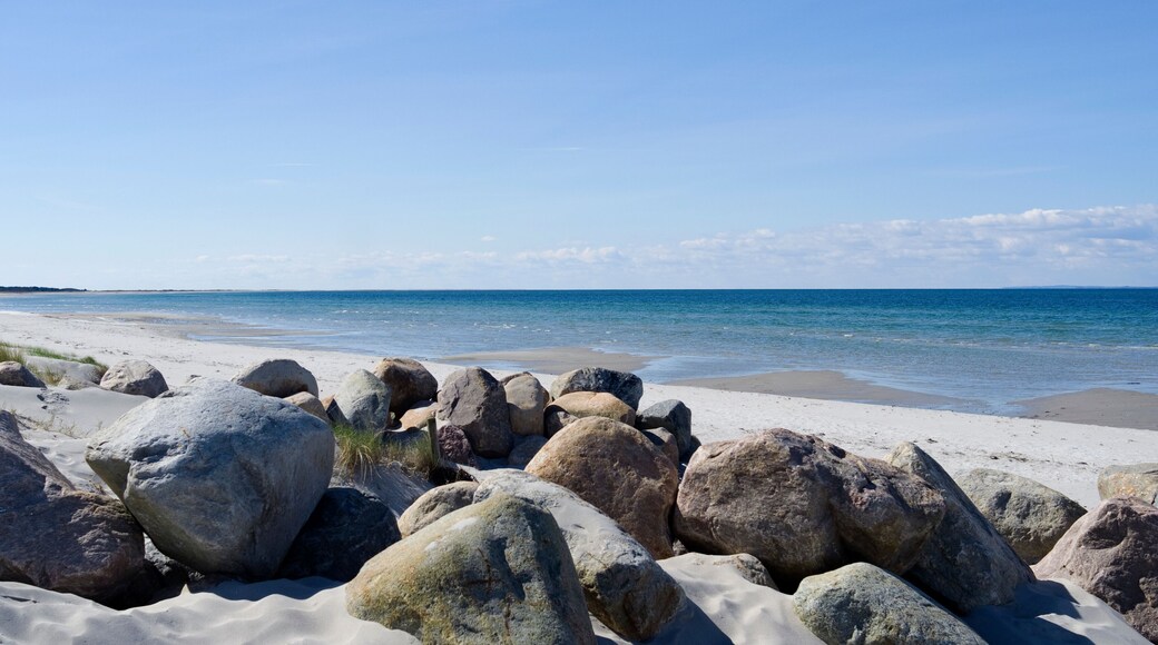 Laesoe / Denmark: Boulders at a beach access in Vesteroe Havn on a sunny day in April