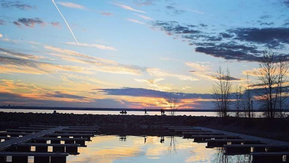 Sunsets and jet trails. The Ottawa Valley, close to Canada's capital, is known for some of the best sunsets anywhere. It's something about the atmospheric conditions. A great spot for viewing them is at this Marina on the Quebec side of the Ottawa River. #blue