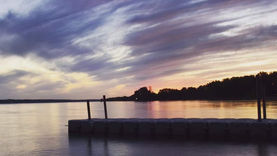 My local beach and sailboat dock. Just a fabulous summer place to sit and watch the sunset fade to night. #lovemytown