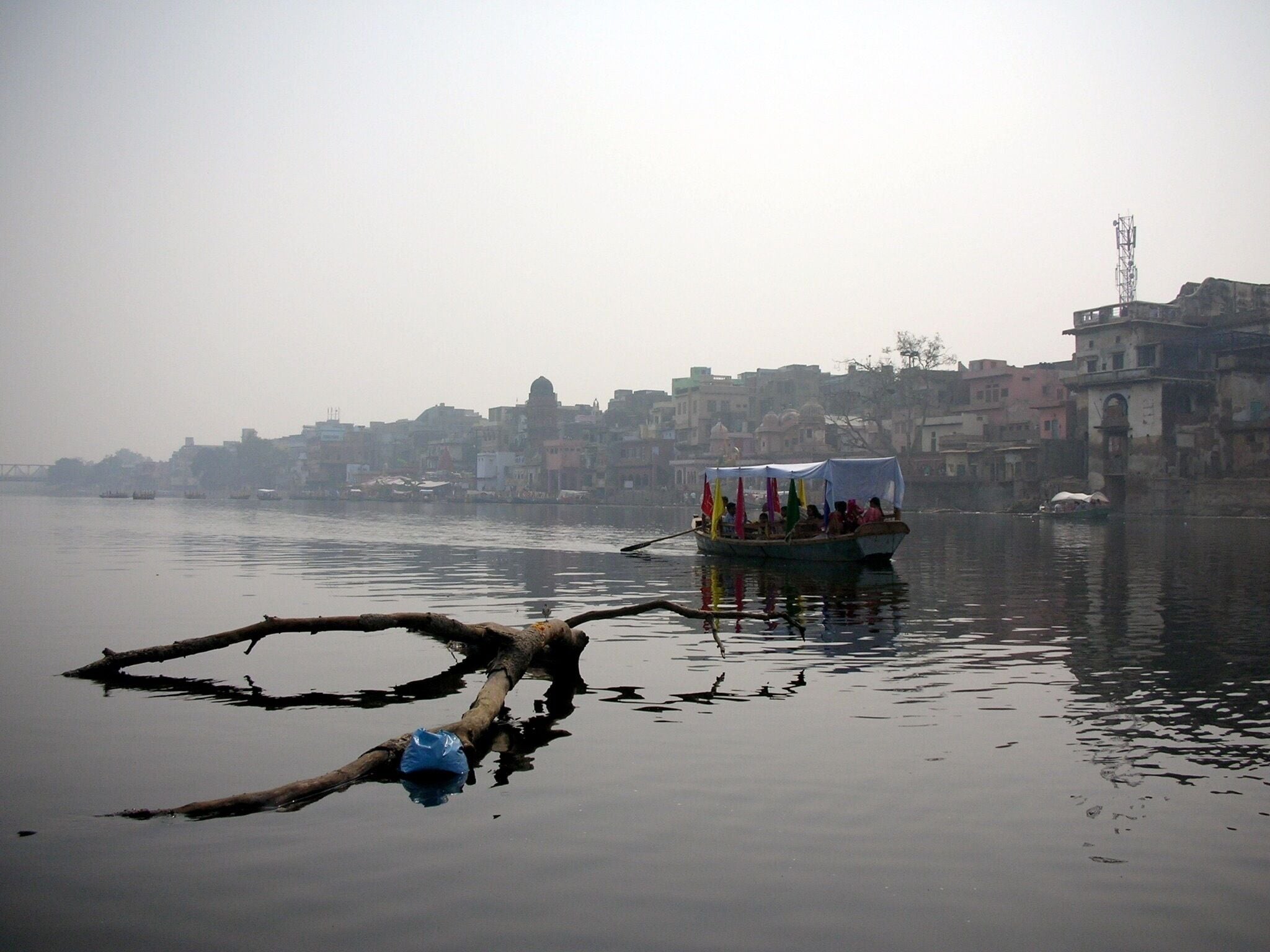 Boating on Yamuna river at Askunda Ghaat, Mathura. 