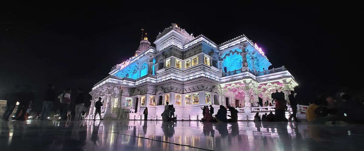 Prem Mandir Vrindavan Illuminated at Night with Vibrant Colors