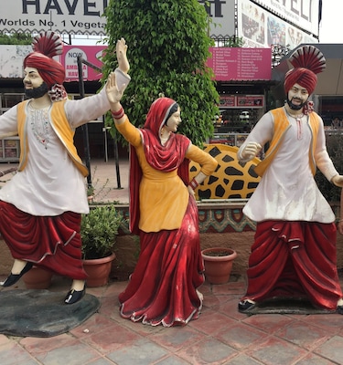 This is a famous North Indian restaurant at highway en route from Delhi-Chandigarh, named Haveli (translated as the palace). It serves authentic North Indian cuisine with pure spices and butter. It’s entrance has these dummies that colonise our minds while showcasing the culture of Punjab(an Indian state). #Red