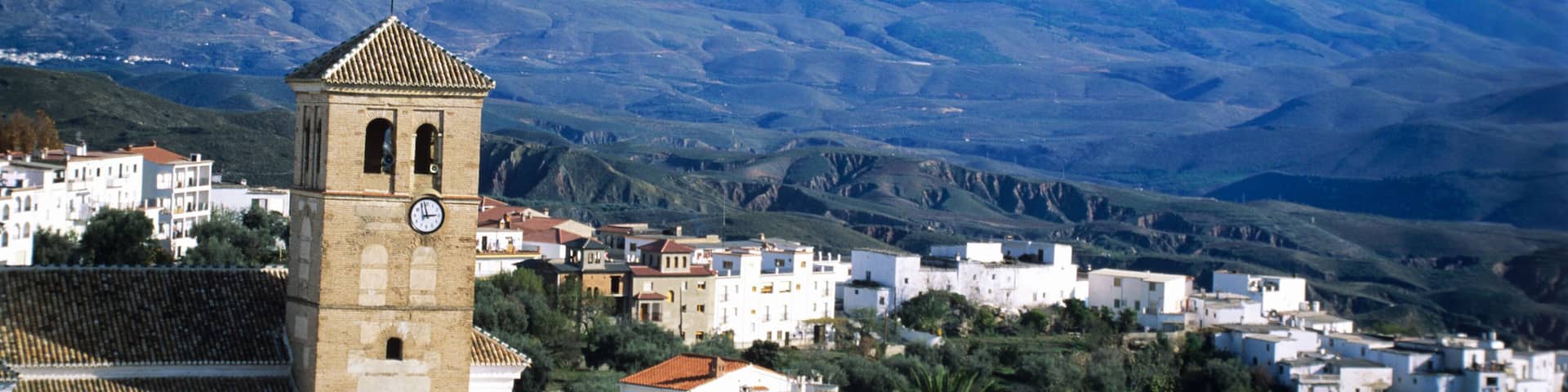 AEHE03 The village of Valor in the Alpujarra region with snow on the Sierra. Granada province, Spain.