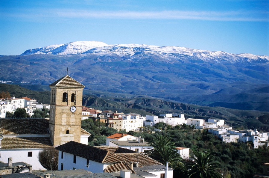 AEHE03 The village of Valor in the Alpujarra region with snow on the Sierra. Granada province, Spain.
