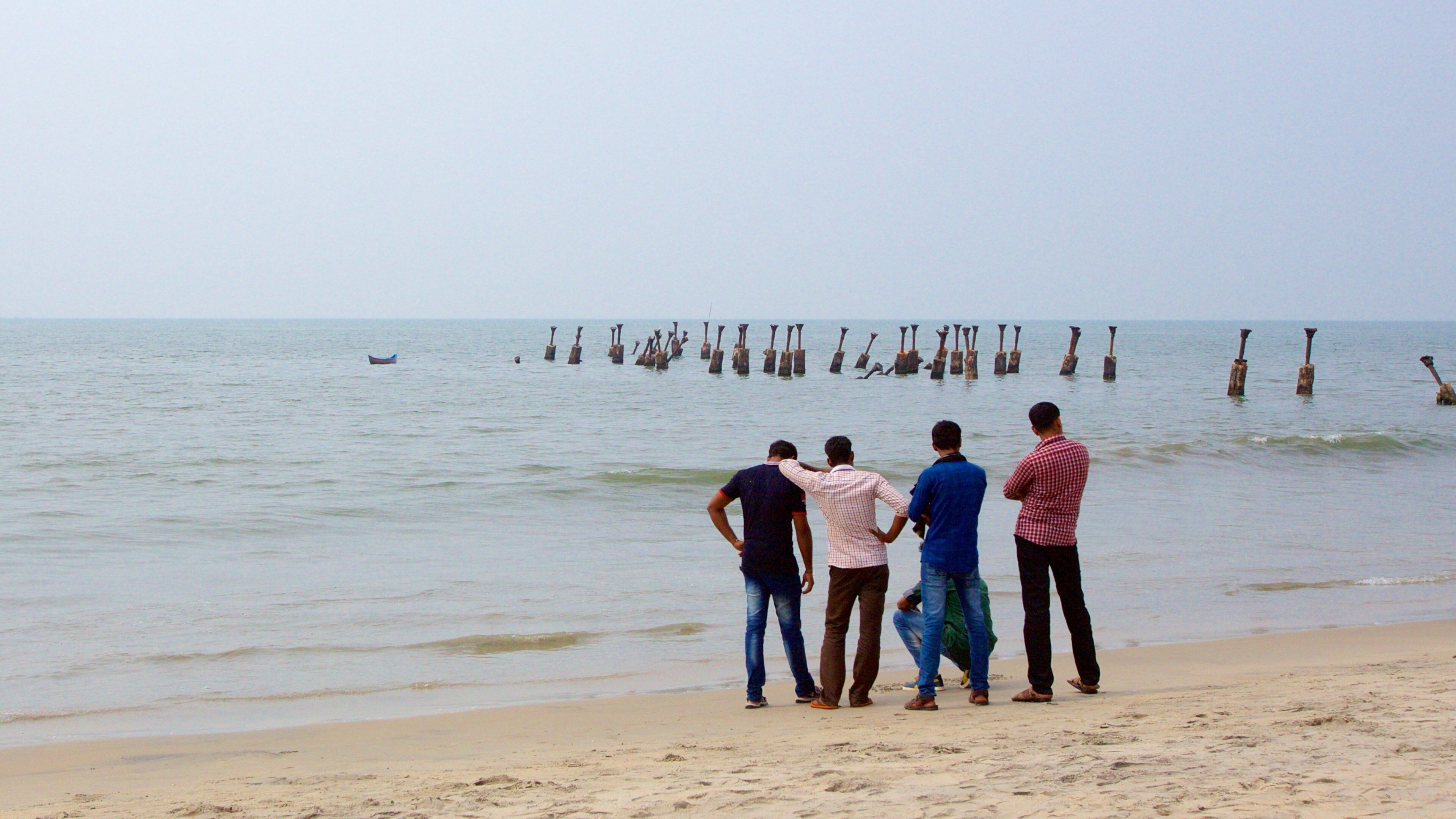 Malappuram District which includes a beach as well as a small group of people