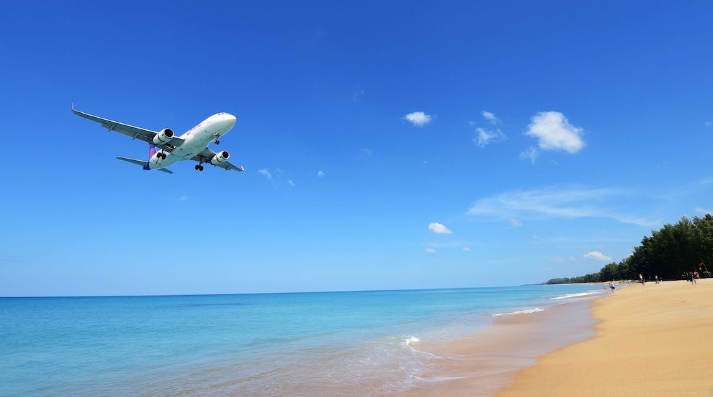 PHUKET, THAILAND - NOVEMBER 17 : The airplane landing at Phuket airport over the Mai Khao Beach on November17, 2016 in Phuket, Thailand.