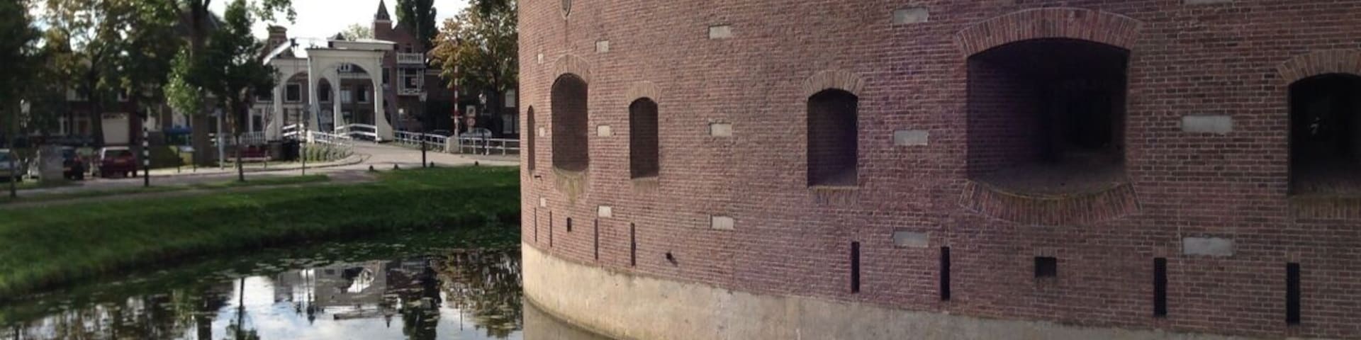 When you are interested in military history, the fortresses of the defense line of Amsterdam are a must see. Build around 1900, it consists of some 46 fortresseses, batteries, dikes, dams and locks. The enemy was partly kept out by inundating the land outside the defense line. The invention of the airplane was a real spoiler for military strategists...
Note: this fortress, Bastion de Bakkerschans, is not open to the public, but many other fortresses are. http://www.stellingvanamsterdam.nl/en/home