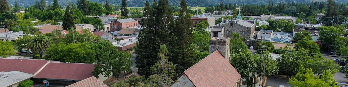 Aerial view of St. Helena Roman Catholic Church, historic church building in St. Helena, Napa Valley, California, USA. Built from 1889 to 1890, the church was constructed with stone, a common building
