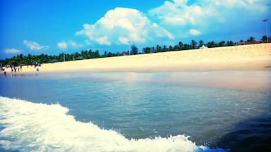 Lovely trail of water waves and clouds on the beach.
#WeekendGetaway