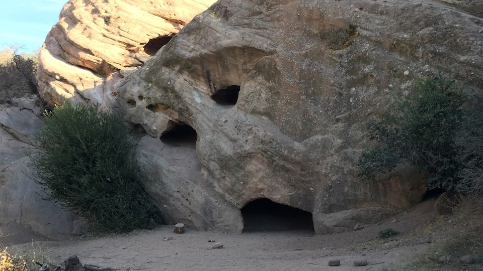 Explore fun sandstone caves carved out by ancient oceans. Accessing the middle cave requires some minor rock climbing. Reaching the upper cave can be a little more challenging.