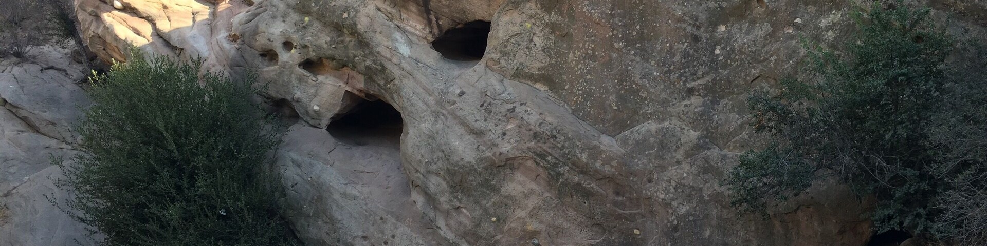 Explore fun sandstone caves carved out by ancient oceans. Accessing the middle cave requires some minor rock climbing. Reaching the upper cave can be a little more challenging.