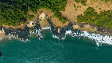 drone shot of blue water beach in maharashtra