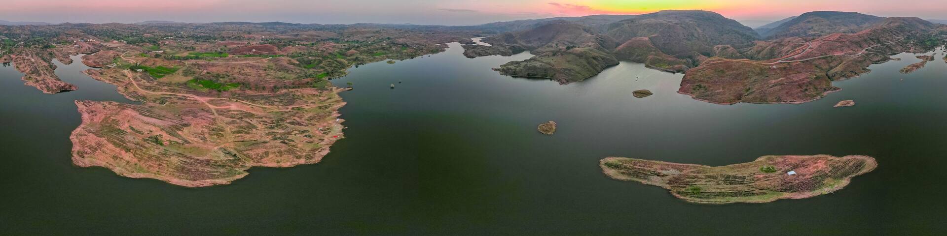 aerial drone panoramic shot Alsigarh lake Rayta bahubali aravalli hills just outside udaipur a fast growing tourist spot in the city of lakes tourist spot in Rajasthan