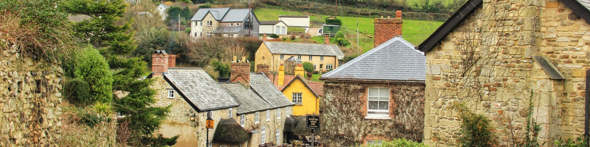 Somewhere I'd never heard of before visiting but totally fell in love with as soon as I arrived.
Branscombe is reportedly the longest village in England and also “one of the most relaxing and picturesque villages on the Jurassic Coastline,” according to visitsouthdevon.co.uk.
Although the village is tiny (around 500 inhabitants) there's quite a bit to see and do here - three national trust properties, a grade 1 listed church dating back to circa 955, and a stunning coastal path (which you can hike) leading to the pretty town of Beer.
You can read more here:
https://galloparoundtheglobe.com/a-weekend-in-branscombe-devon-the-longest-and-possibly-the-prettiest-village-in-england/