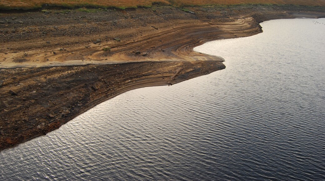 Bleak scene at the (rather low) Baitings reservoir, the higher of two reservoirs near Ripponden. This is taken from the road bridge.