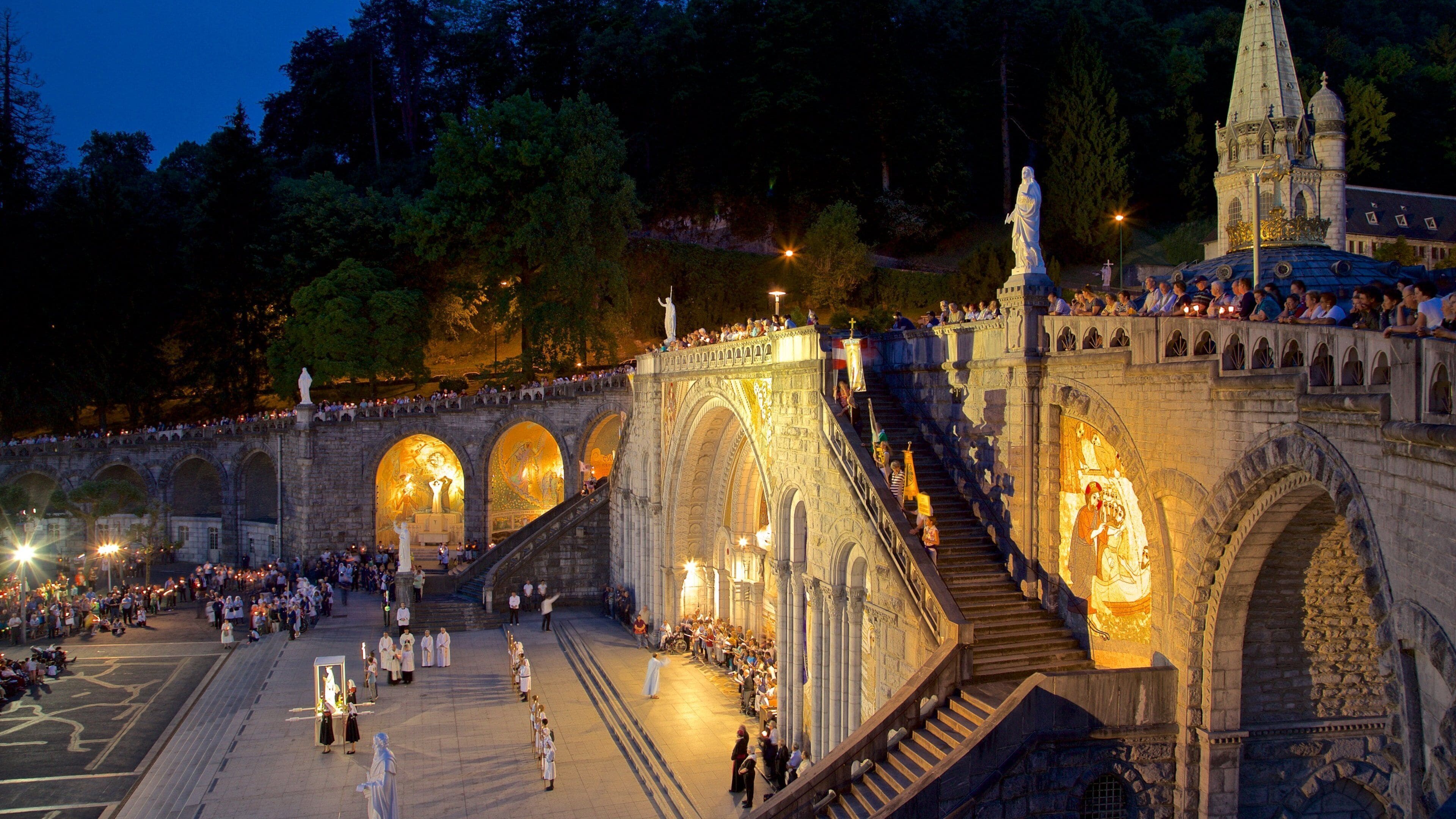 Rosary Basilica showing heritage architecture and night scenes as well as a large group of people