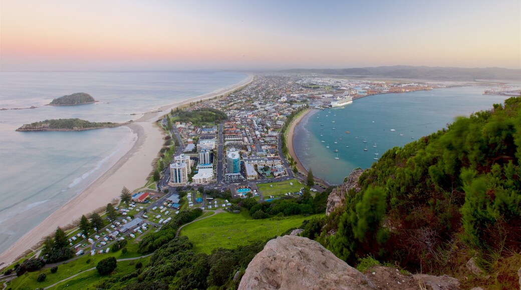 Mount Maunganui featuring general coastal views, a coastal town and a sunset