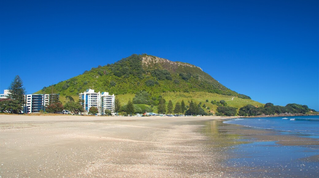 Mount Maunganui which includes general coastal views, mountains and a beach