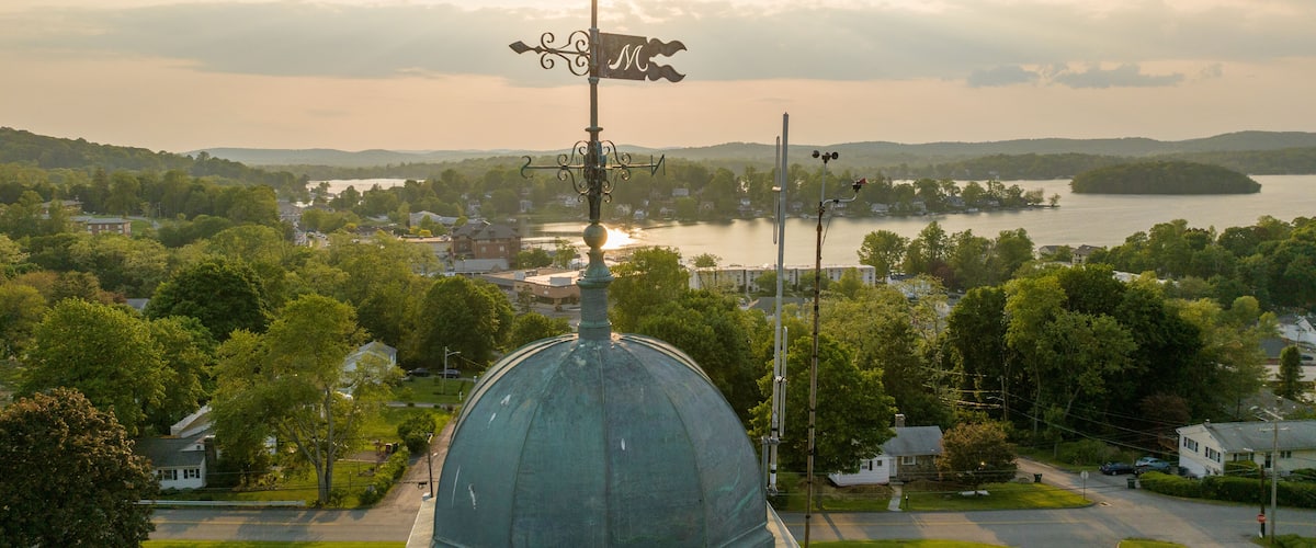Late afternoon aerial photo of Lake Mahopac located in Town of Carmel, Putnam County, New York.